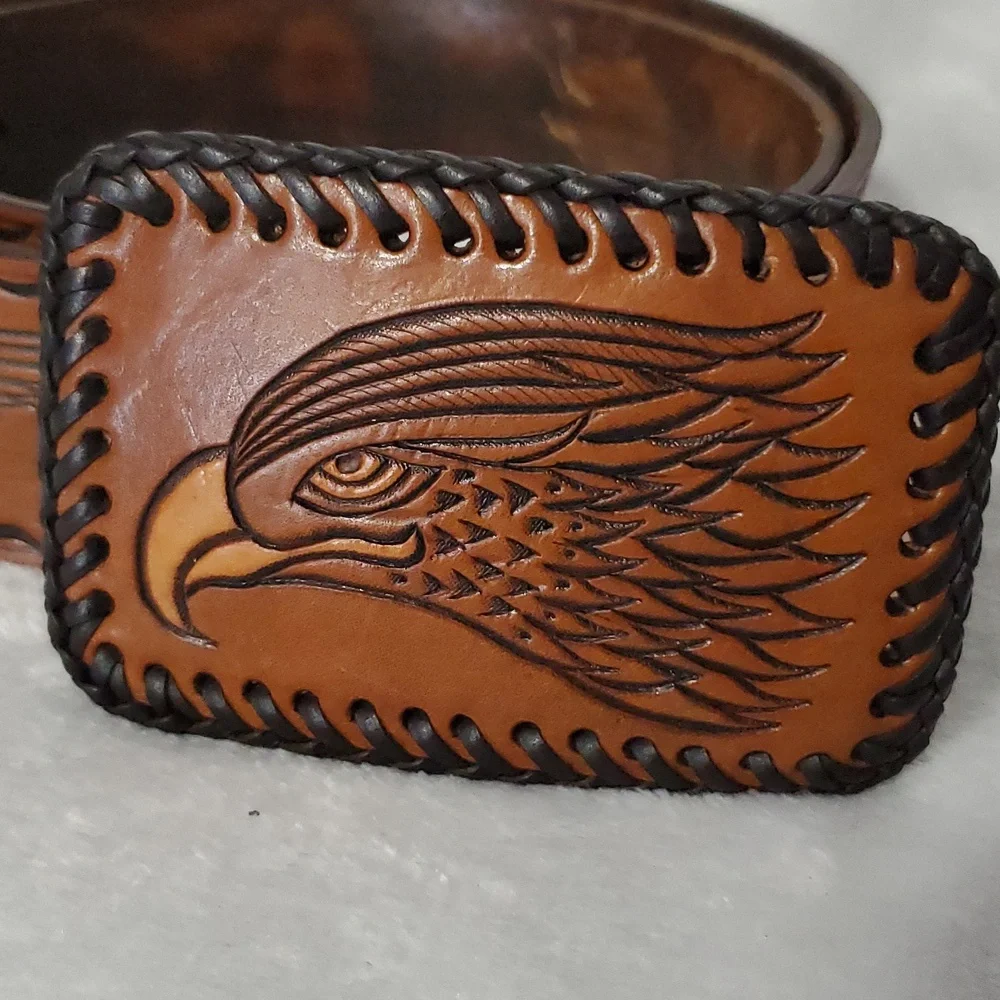 Vintage Leather Belt With Eagle Buckle and Details Embossed Along the Strap.